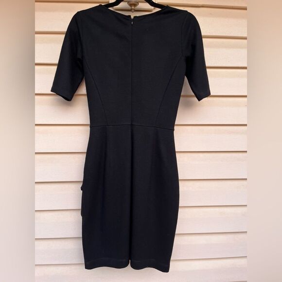 Theory black bodycon midi dress. Short sleeves, front waist valance, zipper, 2 - Picture 7 of 7